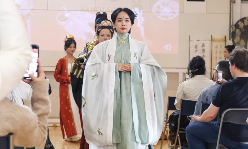 Hanfu enthusiasts attend a Hanfu display event held to celebrate the upcoming Mid-Autumn Festival in London, Britain, Sept. 8, 2024. (Xinhua)