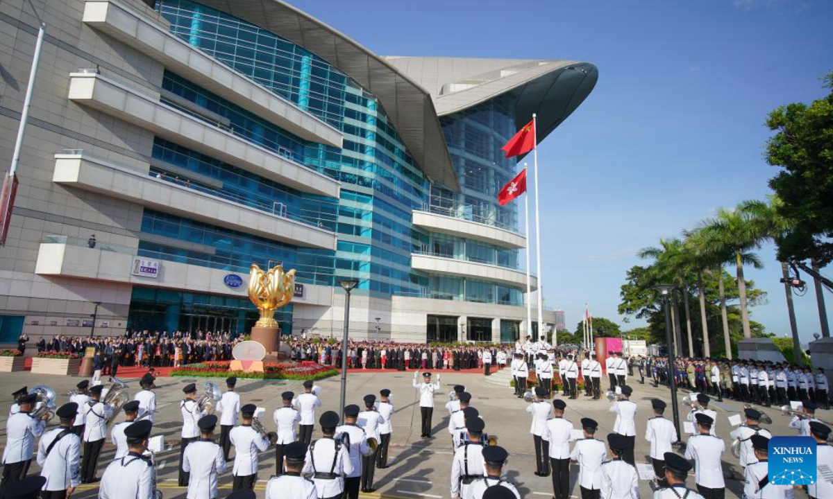 The Hong Kong Special Administrative Region (HKSAR) government holds a flag-raising ceremony and a reception to celebrate the 75th anniversary of the founding of the People's Republic of China in Hong Kong, south China, Oct 1, 2024. Photo:Xinhua