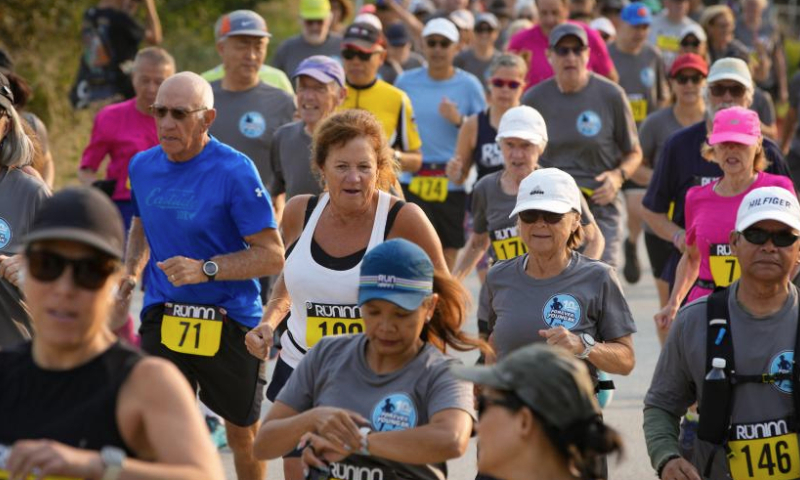 Seniors take part in the Forever Young 8K Run in Richmond, British Columbia, Canada, Sept. 8, 2024.

Hundreds of senior runners, joggers, and walkers took part in the Forever Young 8K Run here on Sunday to celebrate the 10th anniversary of the event. (Photo by Liang Sen/Xinhua)