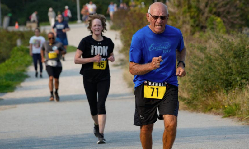 Seniors take part in the Forever Young 8K Run in Richmond, British Columbia, Canada, Sept. 8, 2024.

Hundreds of senior runners, joggers, and walkers took part in the Forever Young 8K Run here on Sunday to celebrate the 10th anniversary of the event. (Photo by Liang Sen/Xinhua)