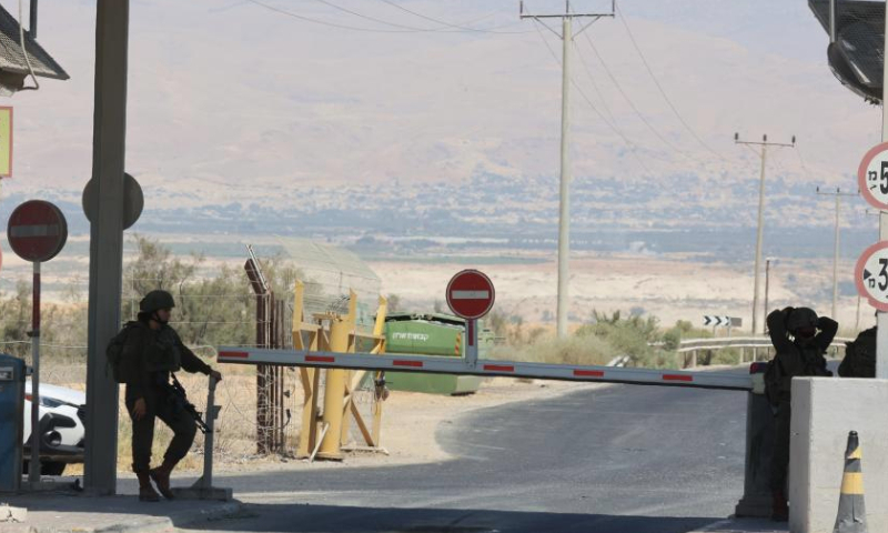 Members of Israeli security forces stand guard at the Allenby Bridge, a border point between Jordan and the occupied West Bank on Sept. 8, 2024. (Photo by Gil Cohen Magen/Xinhua)