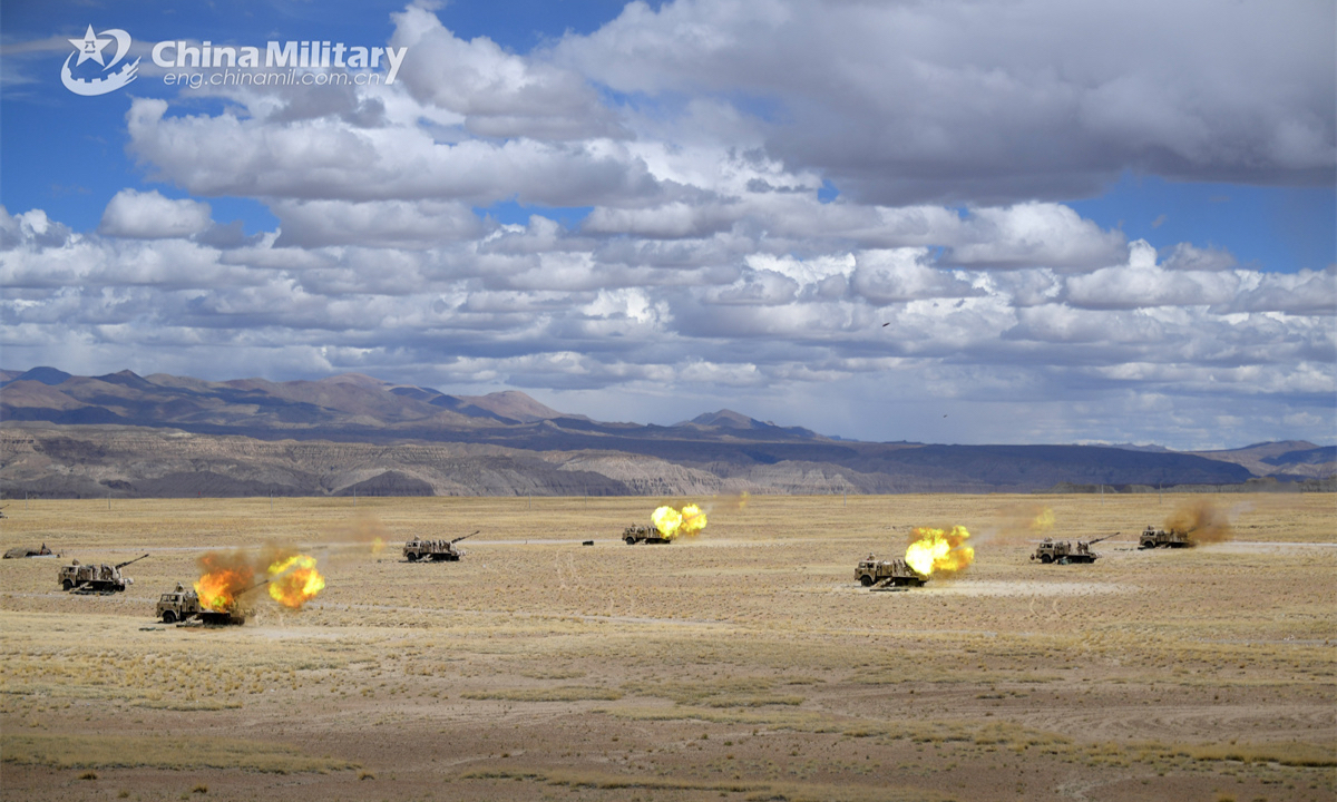 A battery of vehicle-mounted howitzers attached to a brigade of the Chinese PLA Army spit fire at mock targets during a live-fire shooting assessment on September 10th, 2024. (Photo: eng.chinamil.com.cn)