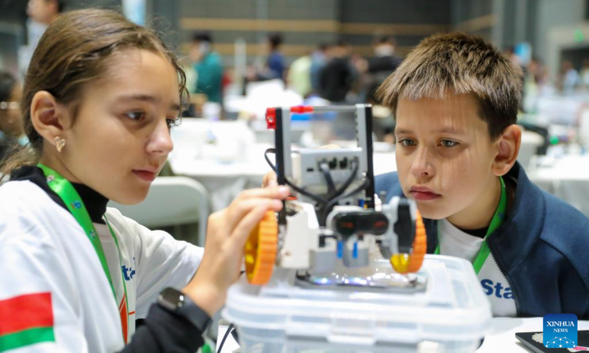 Competitors take part in the RoboCup Asia-Pacific 2024 in Qingdao, east China's Shandong Province, Oct. 26, 2024. More than 200 teams from over 20 countries and regions participated in this competition. (Photo: Xinhua)