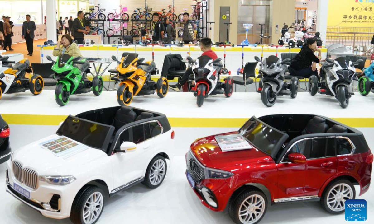 Merchants visit the 18th International Bicycles, Baby Strollers and Toys Fair in Pingxiang County, north China's Hebei Province, Oct. 26, 2024. The fair opened here on Saturday, with more than 3,000 booths and attracting merchants from over 80 countries and regions. Pingxiang of Hebei Province is renowned for its industry of bicycles, baby strollers and toys. (Photo: Xinhua)