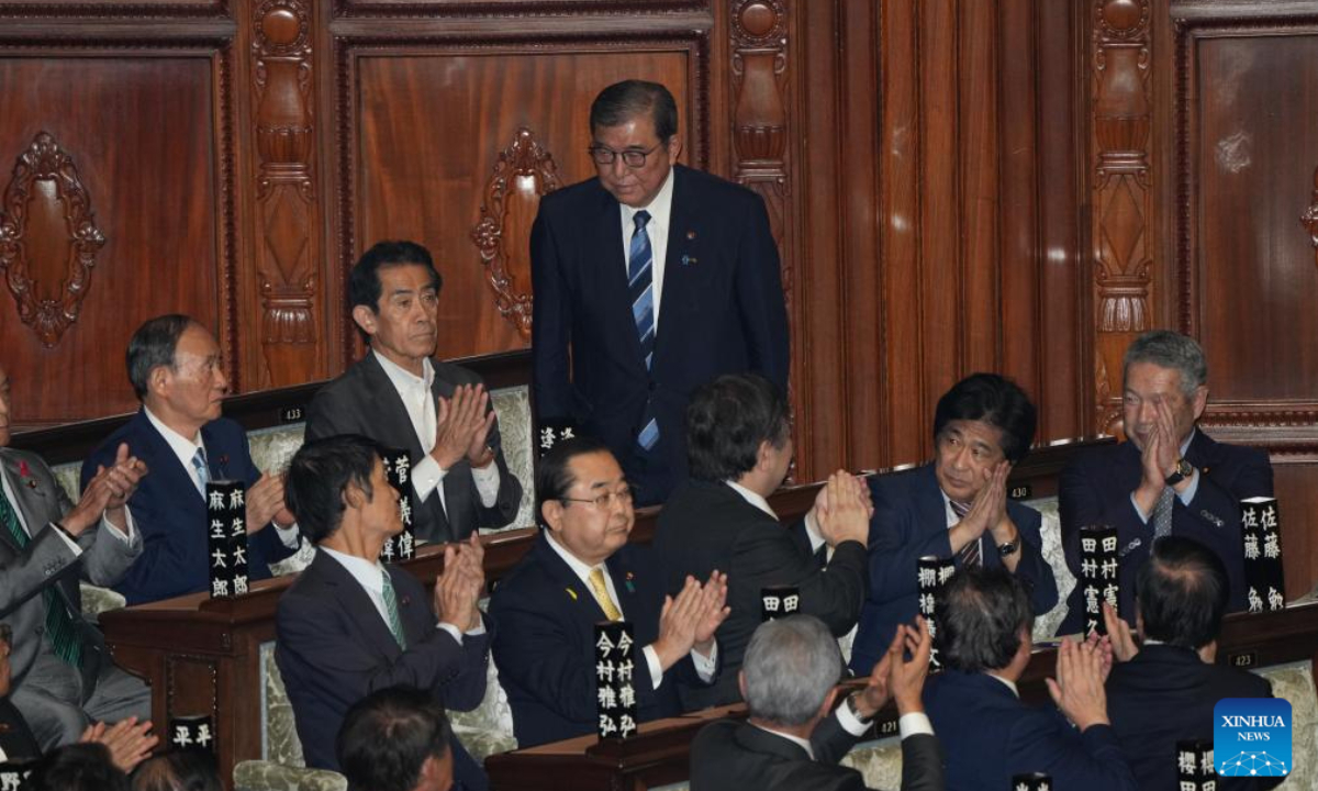 Shigeru Ishiba stands during a special Diet session in Tokyo, Japan, Oct 1, 2024. Shigeru Ishiba, leader of Japan's ruling Liberal Democratic Party, was officially elected the country's prime minister on Tuesday after winning a majority of votes in both houses of parliament. He replaces Fumio Kishida, who resigned with his cabinet on Tuesday morning amid mounting criticism over the ruling party's slush fund scandal and diving public approval ratings. Photo:Xinhua