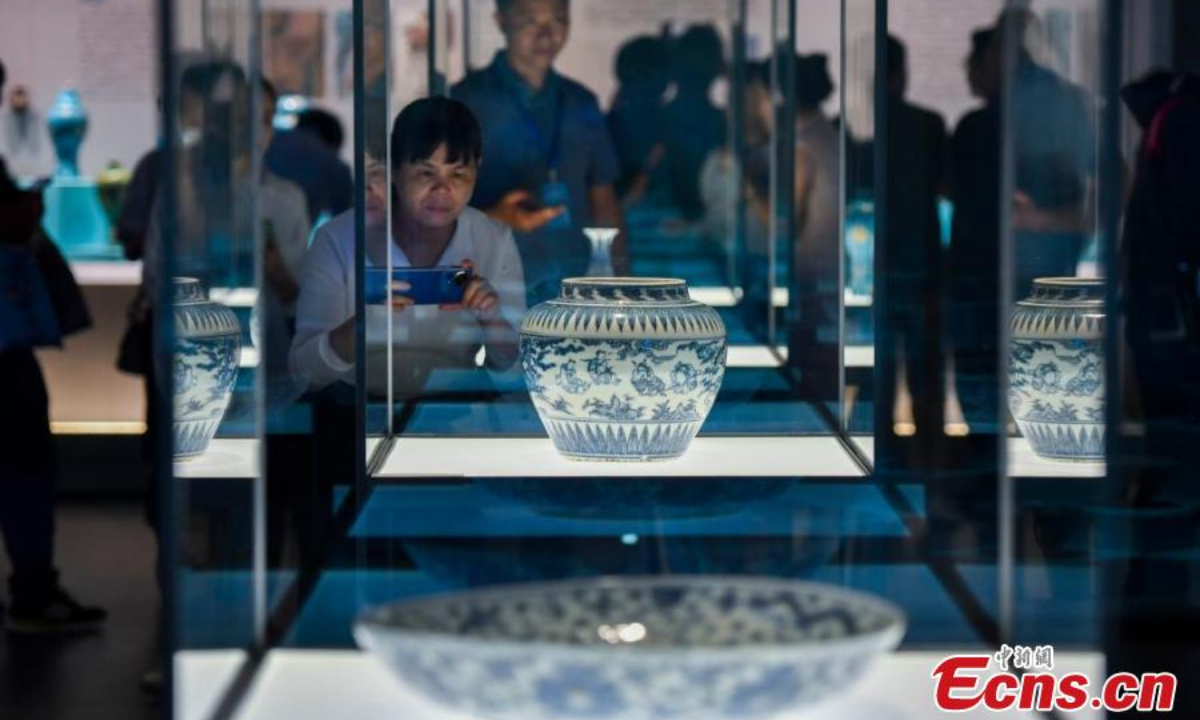 People visit an exhibition featuring relics retrieved from two ancient shipwrecks discovered in the South China Sea at the China (Hainan) Museum of the South China Sea in Qionghai, south China's Hainan Province, Sep 27, 2024. Photo:China News Service