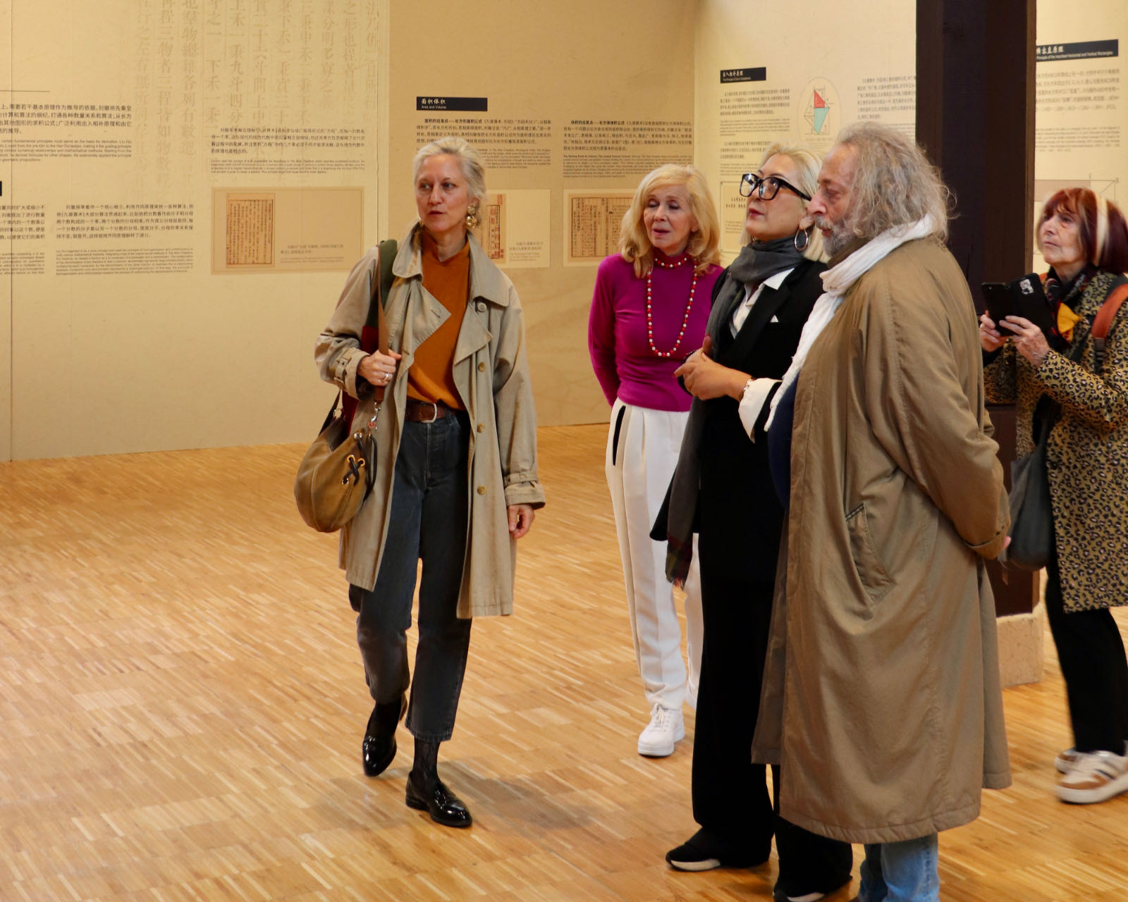 Some visitors explore the exhibition featuring Liu’s achievements in mathematics at Réfectoire des Cordeliers in Paris on September 24, 2024.