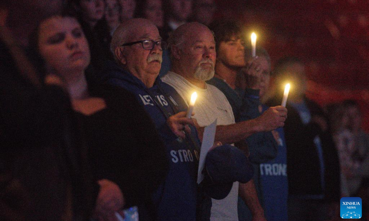 A candlelight vigil is held to mourn Lewiston shooting victims in Lewiston, Maine, the United States on Oct. 25, 2024. This Friday marks the one year anniversary of the mass shooting in Lewison back in 2023. As many as 18 people were killed and 13 injured in the mass shooting. (Photo: Xinhua)