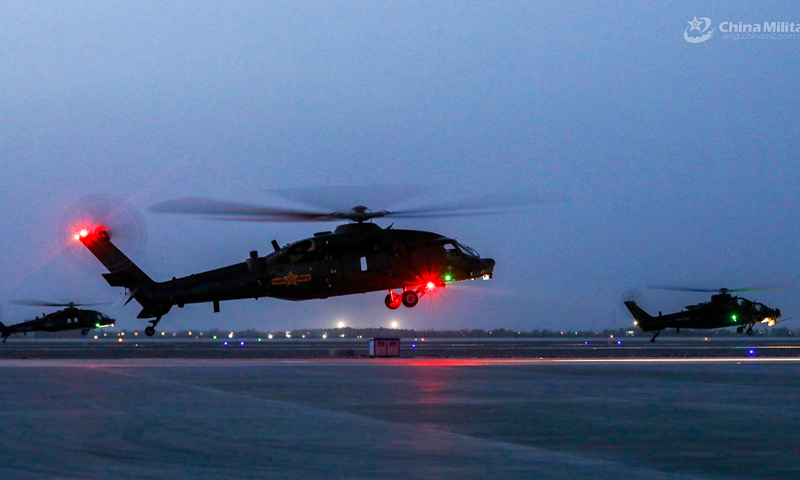 Helicopters attached to a brigade under the Chinese PLA 76th Group Army lift off in formation during a round-the-clock flight training exercise on August 22, 2024. (eng.chinamil.com.cn/Photo by Li Xiaoxiao)