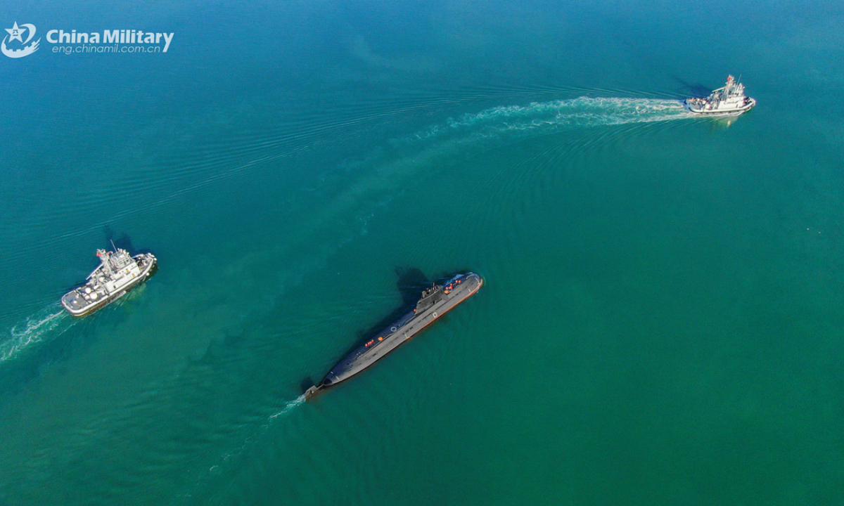 A submarine attached to a naval submarine flotilla under the Chinese PLA Northern Theater Command bears off a port after separating from the tugboats during a maritime training exercise in early October, 2024. (Photo: eng.chinamil.com.cn)