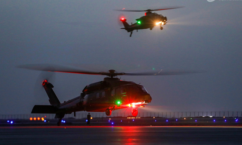 Helicopters attached to a brigade under the Chinese PLA 76th Group Army lift off in formation during a round-the-clock flight training exercise on August 22, 2024. (eng.chinamil.com.cn/Photo by Li Xiaoxiao)