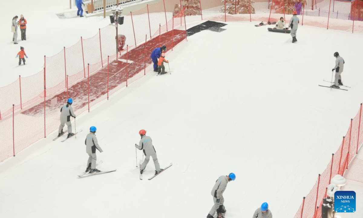 People ski at the Shanghai L+SNOW Indoor Skiing Theme Resort in Shanghai, south China, Sep 6, 2024. Photo:Xinhua