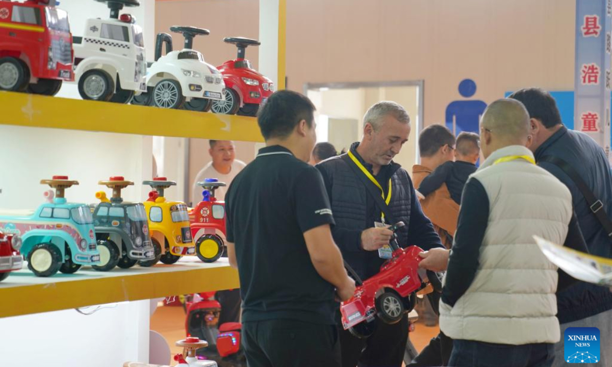 Merchants visit the 18th International Bicycles, Baby Strollers and Toys Fair in Pingxiang County, north China's Hebei Province, Oct. 26, 2024. The fair opened here on Saturday, with more than 3,000 booths and attracting merchants from over 80 countries and regions. Pingxiang of Hebei Province is renowned for its industry of bicycles, baby strollers and toys. (Photo: Xinhua)