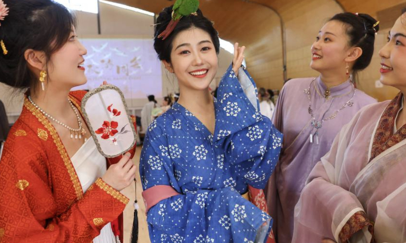 Hanfu enthusiasts attend a Hanfu display event held to celebrate the upcoming Mid-Autumn Festival in London, Britain, Sept. 8, 2024. (Xinhua)