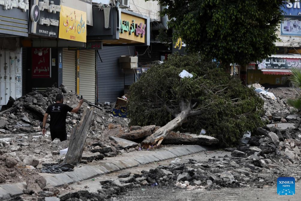 A man walks on a damaged street after an Israeli raid in the West Bank city of Jenin, Sept. 4, 2024. Israel's military operations across the West Bank starting from Aug. 28 have caused great damages and casualties. (Photo: Xinhua)