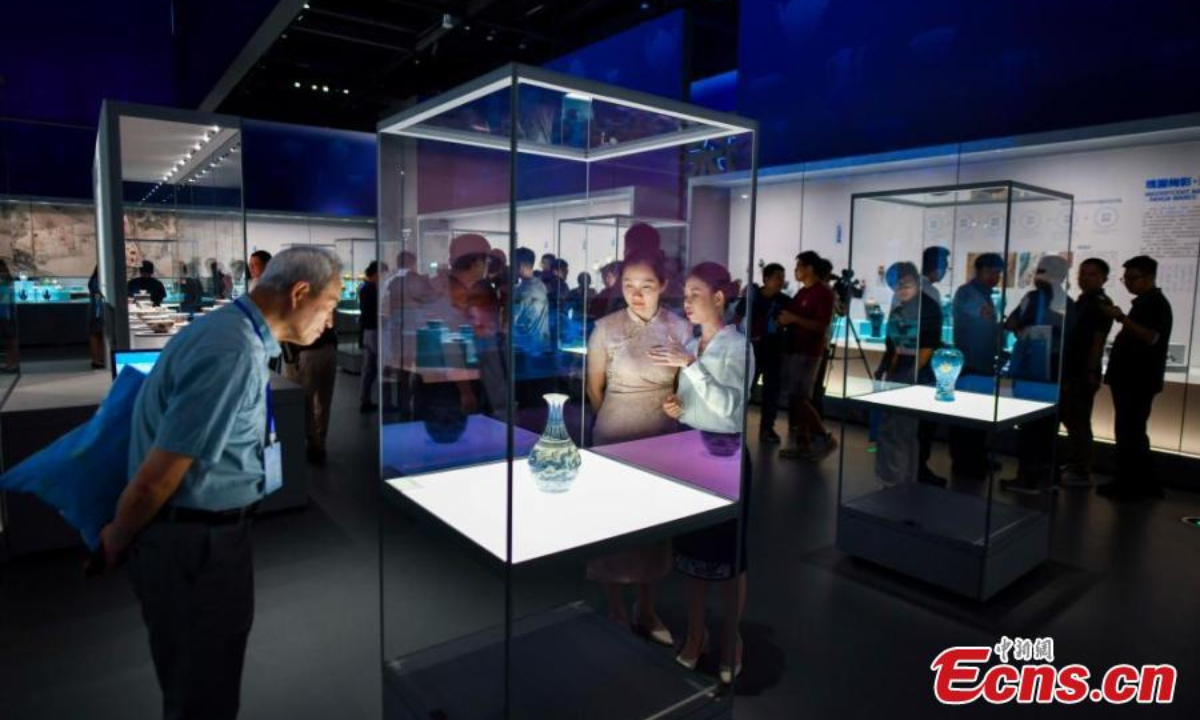 People visit an exhibition featuring relics retrieved from two ancient shipwrecks discovered in the South China Sea at the China (Hainan) Museum of the South China Sea in Qionghai, south China's Hainan Province, Sep 27, 2024. Photo:China News Service