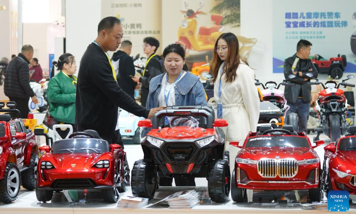 Merchants visit the 18th International Bicycles, Baby Strollers and Toys Fair in Pingxiang County, north China's Hebei Province, Oct. 26, 2024. The fair opened here on Saturday, with more than 3,000 booths and attracting merchants from over 80 countries and regions. Pingxiang of Hebei Province is renowned for its industry of bicycles, baby strollers and toys. (Photo: Xinhua)