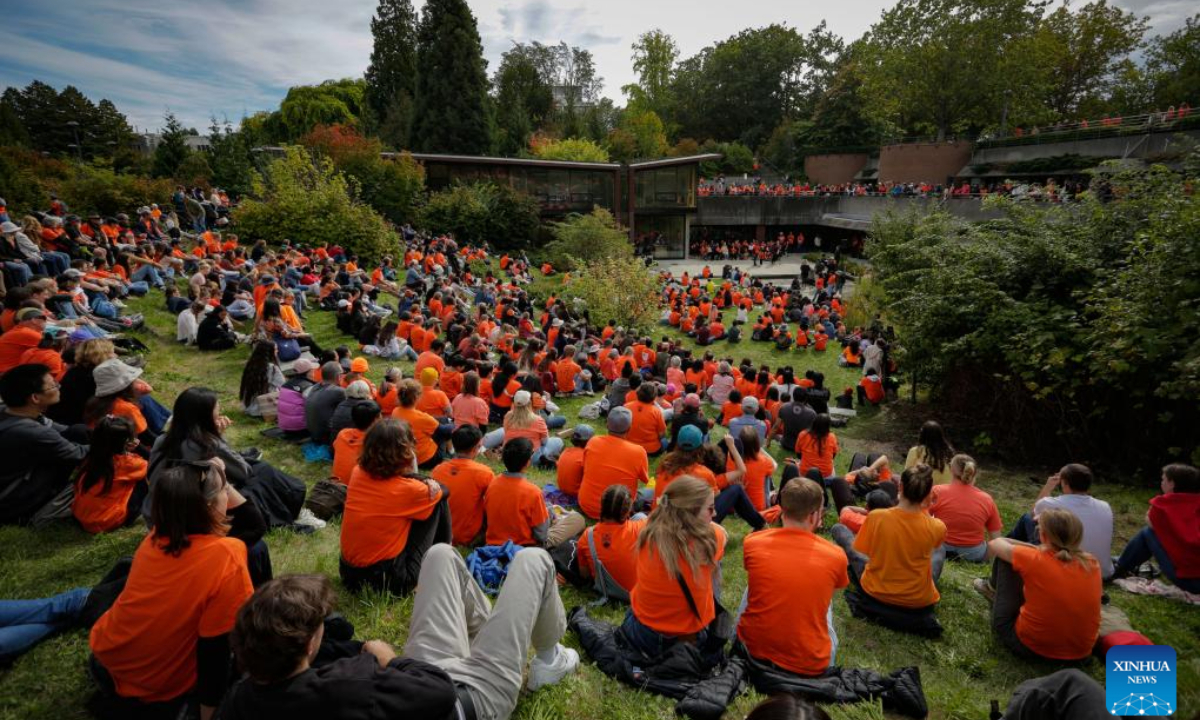 People attend a ceremony marking the National Day for Truth and Reconciliation at the University of British Columbia in Vancouver, British Columbia, Canada, Sep 30, 2024. The annual event, also known as Orange Shirt Day, was established as a federal statutory holiday in 2021 to remember thousands of children who died while being forced to attend church-run and government-funded residential schools and reflect on the ongoing impacts on survivors, their families and communities. Photo:Xinhua