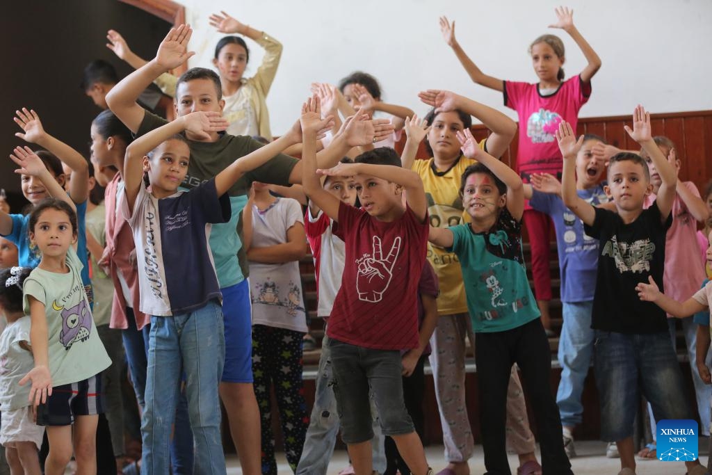 Local children participate in an entertainment activity in the Al-Maghazi refugee camp, central Gaza Strip, on Sept. 5, 2024. Palestinian volunteers on Thursday launched several entertainment activities for children in Gaza to release their psychological pressure that resulted from the ongoing Israel-Hamas conflict. (Photo: Xinhua)