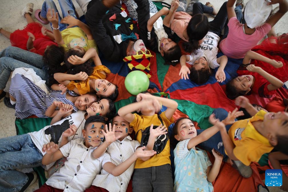 Local children participate in an entertainment activity in the Al-Maghazi refugee camp, central Gaza Strip, on Sept. 5, 2024. Palestinian volunteers on Thursday launched several entertainment activities for children in Gaza to release their psychological pressure that resulted from the ongoing Israel-Hamas conflict. (Photo: Xinhua)