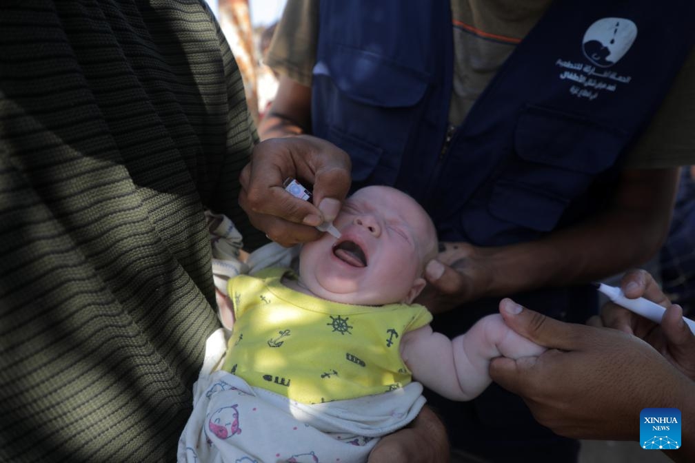 A child receives a dose of the polio vaccine in Khan Younis city in the southern Gaza Strip, on Sept. 5, 2024. The second phase of administering polio vaccinations to children under 10 years of age got underway in Gaza's southern zone, UN humanitarians said on Thursday. (Photo: Xinhua)