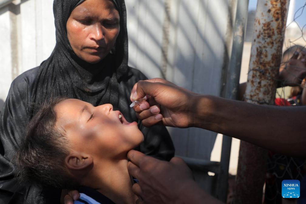 A child receives a dose of the polio vaccine in Khan Younis city in the southern Gaza Strip, on Sept. 5, 2024. The second phase of administering polio vaccinations to children under 10 years of age got underway in Gaza's southern zone, UN humanitarians said on Thursday. (Photo: Xinhua)