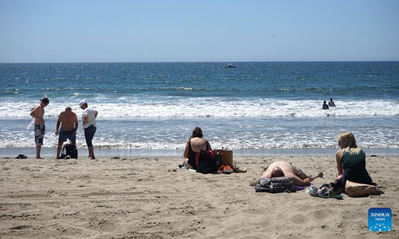 People cool off at Santa Monica beach in Los Angeles, California, the United States, Sept. 4, 2024. As summer draws to a close, cities across the western United States are still reeling from unprecedented heatwaves that have shattered long-standing temperature records and pushed communities to their limits. (Photo: Xinhua)