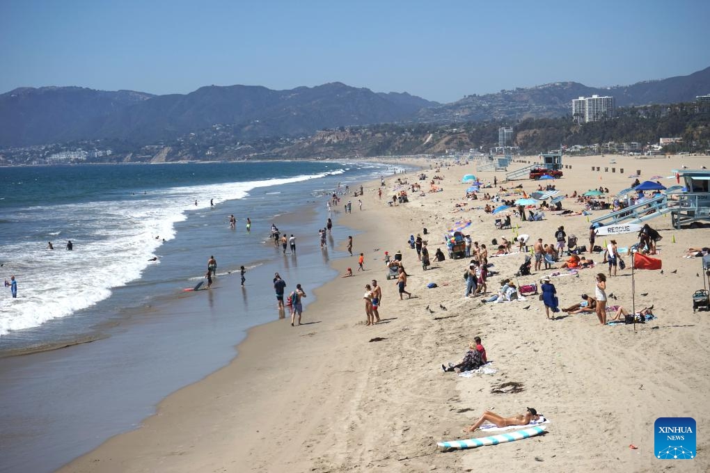 People cool off at Santa Monica beach in Los Angeles, California, the United States, Sept. 4, 2024. As summer draws to a close, cities across the western United States are still reeling from unprecedented heatwaves that have shattered long-standing temperature records and pushed communities to their limits. (Photo: Xinhua)