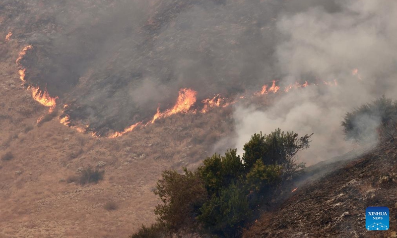 This photo taken on Sept. 7, 2024 shows a wildfire in San Bernardino County, California, the United States. An unrelenting heat wave has engulfed Southern California this week with temperatures in some areas reaching record highs on Friday. Hundreds of firefighters are battling a fast-moving wildfire in high temperatures in San Bernardino County, which grew to 1180 acres (about 4.8 square km) with 24 hours. Photo: Xinhua