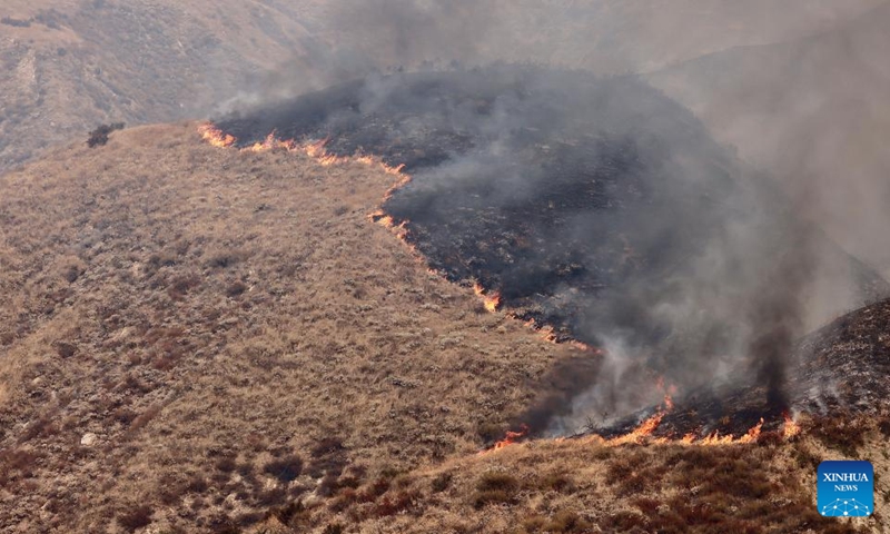 This photo taken on Sept. 7, 2024 shows a wildfire in San Bernardino County, California, the United States. An unrelenting heat wave has engulfed Southern California this week with temperatures in some areas reaching record highs on Friday. Hundreds of firefighters are battling a fast-moving wildfire in high temperatures in San Bernardino County, which grew to 1180 acres (about 4.8 square km) with 24 hours. Photo: Xinhua