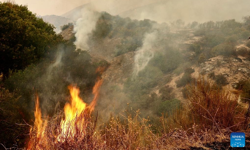 This photo taken on Sept. 7, 2024 shows a wildfire in San Bernardino County, California, the United States. An unrelenting heat wave has engulfed Southern California this week with temperatures in some areas reaching record highs on Friday. Hundreds of firefighters are battling a fast-moving wildfire in high temperatures in San Bernardino County, which grew to 1180 acres (about 4.8 square km) with 24 hours. Photo: Xinhua