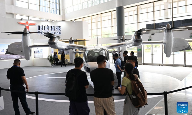 Visitors view an electric aircraft at an exhibition of the 2024 Low Altitude Economic Development Conference in Wuhu, east China's Anhui Province, Sept. 6, 2024. Photo: Xinhua