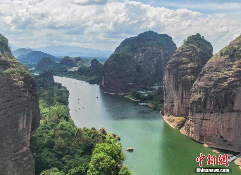 Arial view of Luxi River in Yingtan City, East China's Jiangxi Province on Sept. 7, 2024. The peaks of the Danxia landform, with their unique shapes, stand tall, while bamboo rafts drift on the azure waters, creating a picturesque scene. Photo: China News Service
