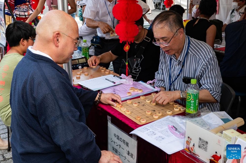 People play Chinese chess during China Festival 2024 at Yoyogi Park in Tokyo, Japan, Sept. 7, 2024. China Festival 2024 kicked off in Yoyogi Park in downtown Tokyo on Saturday to promote people-to-people exchanges between China and Japan. Photo: Xinhua