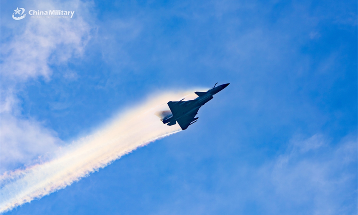 Fighter jet attached to an aviation brigade under the Chinese PLA Southern The<strong></strong>ater Command speeds up during a round-the-clock flight training exercise on August 7, 2024. (eng.chinamil.com.cn/Photo by Hou Kaiwen)