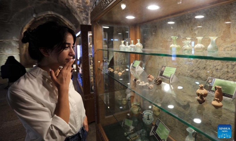 A visitor views exhibits in the museum in the historical Ajloun Castle in Ajloun, some 73 km north of Amman, Jordan, Sept. 6, 2024. Ajloun Castle, a 12th-century castle situated in northwestern Jordan, is now a tourist attraction featuring Arab military architecture. Photo: Xinhua