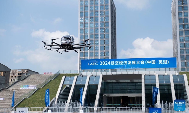 A low-altitude aircraft makes a flight demonstration outside the venue of the 2024 Low Altitude Economic Development Conference in Wuhu, east China's Anhui Province, Sept. 6, 2024. Photo: Xinhua