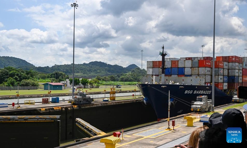 A cargo vessel sails through the Miraflores Locks on the Panama Canal near Panama City, Panama, Aug. 28, 2024. The Panama Canal, connecting the Pacific and Atlantic Oceans, spans over 80 kilometers and is one of the world's most important trade waterways. The Panama Canal officially opened on Aug. 15, 1914. This year marks the 110th anniversary of its inauguration. Photo: Xinhua