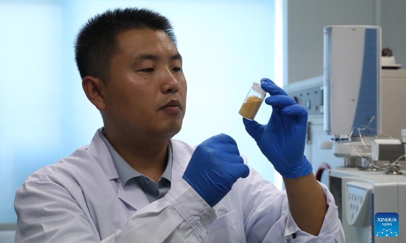 Wang Zhen checks an animal sample in the Liaoning Ocean and Fisheries Science Research Institute in Dalian, northeast China's Liaoning Province, Sept. 6, 2024. Photo: Xinhua