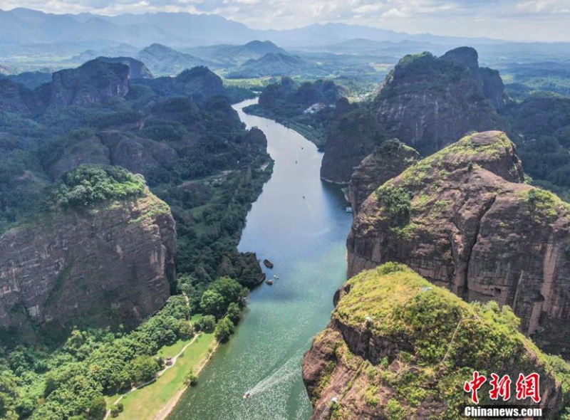 Arial view of Luxi River in Yingtan City, East China's Jiangxi Province on Sept. 7, 2024. The peaks of the Danxia landform, with their unique shapes, stand tall, while bamboo rafts drift on the azure waters, creating a picturesque scene. Photo: China News Service
