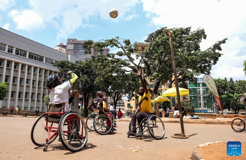 People with disabilities play basketball in the street during a car-free day event in Kampala, capital of Uganda, Sept 7, 2024. A car-free day event was held here Saturday to underscore the need for sustainable urban environments. Photo: Xinhua