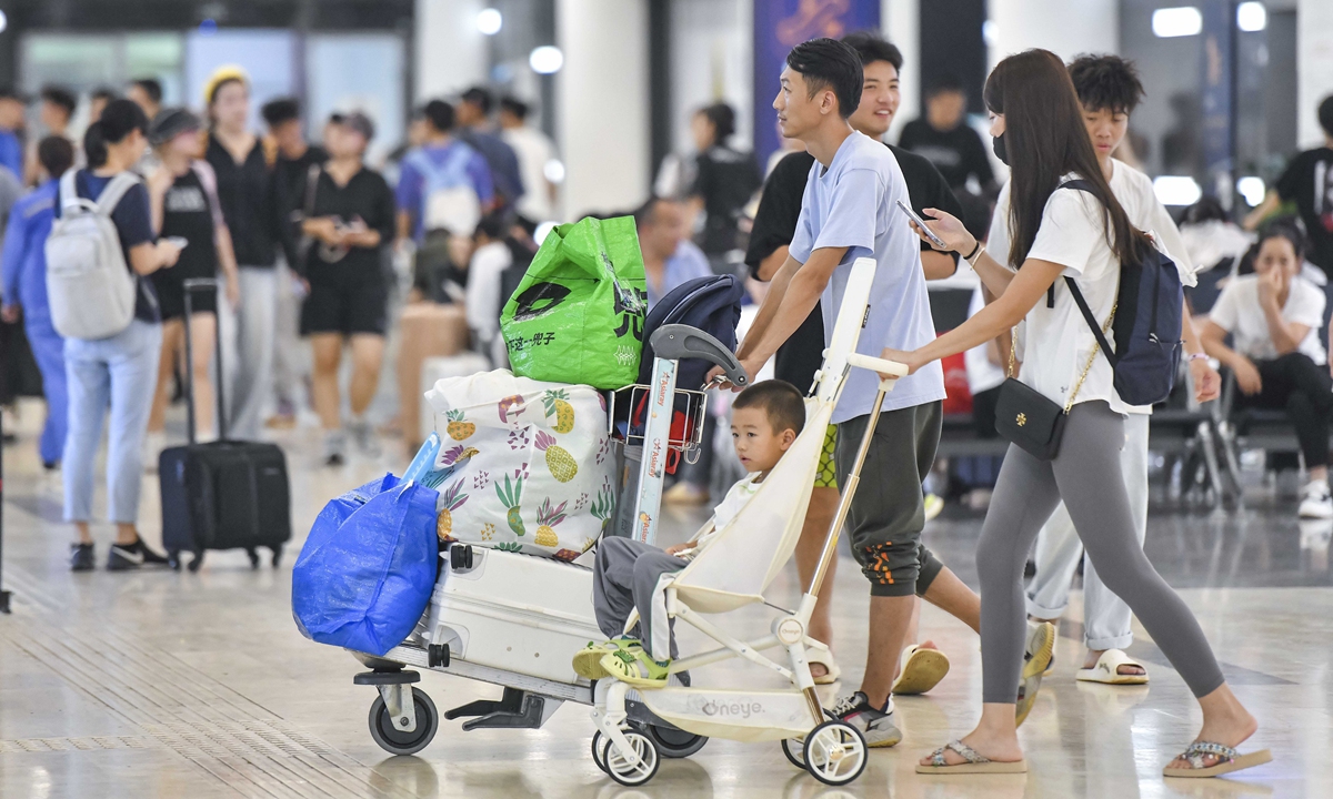 Travelers arrive at Haikou Meilan International Airport in South China's Hainan Province on September 8, 2024 as the airport resumed flight operations after being temporarily closed due to the impact of Super Typhoon Yagi, the strongest to hit the Chinese mainland in autumn on record. Photo: VCG