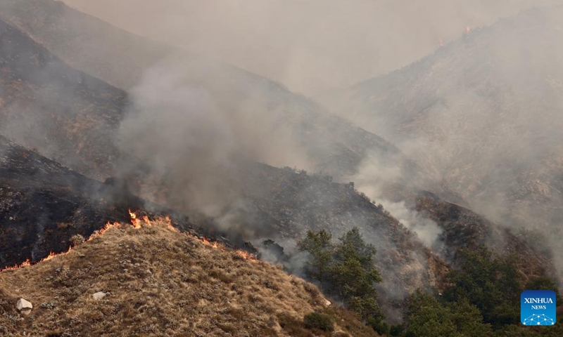 This photo taken on Sept. 7, 2024 shows a wildfire in San Bernardino County, California, the United States. An unrelenting heat wave has engulfed Southern California this week with temperatures in some areas reaching record highs on Friday. Hundreds of firefighters are battling a fast-moving wildfire in high temperatures in San Bernardino County, which grew to 1180 acres (about 4.8 square km) with 24 hours. Photo: Xinhua