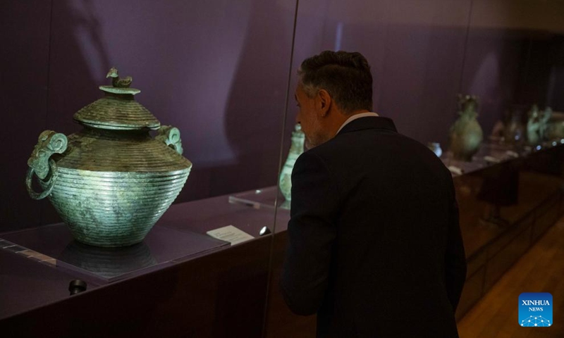 A visitor looks at an exhibit at an exhibition The Splendor of Chinese Bronzes: Masterpieces from the National Museum of China at Macao Museum of Art in Macao, south China, Sept. 6, 2024. The exhibition kicked off on Friday in Macao, showcasing more than 150 ancient bronzes from the collection of the National Museum of China. Photo: Xinhua