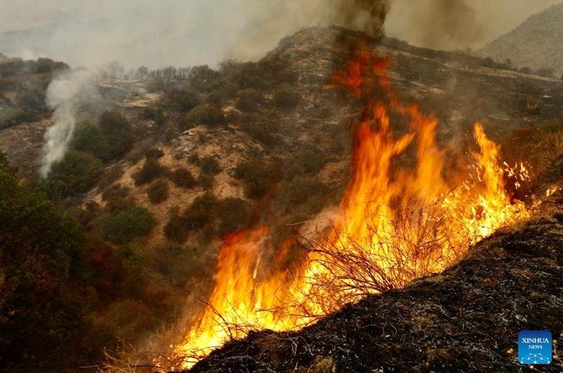 This photo taken on Sept. 7, 2024 shows a wildfire in San Bernardino County, California, the United States. An unrelenting heat wave has engulfed Southern California this week with temperatures in some areas reaching record highs on Friday. Hundreds of firefighters are battling a fast-moving wildfire in high temperatures in San Bernardino County, which grew to 1180 acres (about 4.8 square km) with 24 hours. Photo: Xinhua