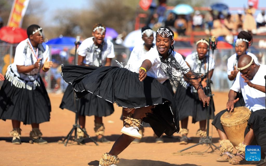 People dance during the Dithubaruba cultural festival in Molepolole village of Botswana on Sept. 7, 2024. The event was held here Saturday to promote Kweneng cultural heritage. It is one of the national events celebrated by Bakwena tribe with various cultural activities ranging from traditional dance, poetry, contemporary music and traditional foods. (Photo: Xinhua)