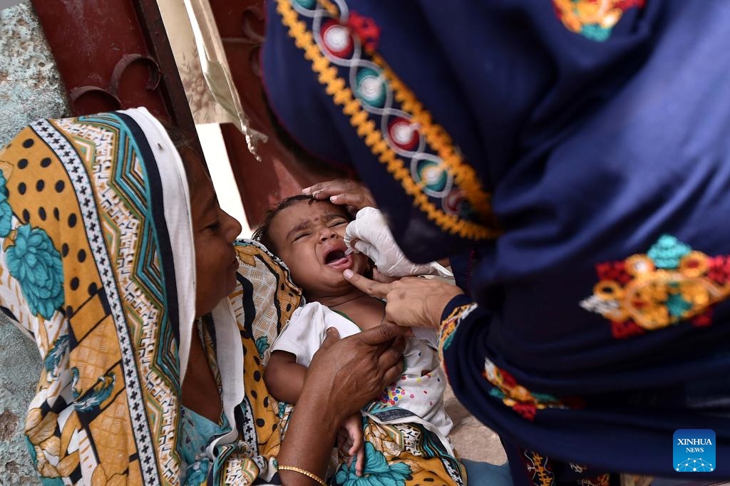 A health worker gives polio vaccination drops to a child during a special nationwide anti-polio campaign in southern Pakistani port city of Karachi on Sept. 9, 2024. Pakistani Prime Minister Shehbaz Sharif on Sunday kicked off a special nationwide anti-polio campaign as part of efforts to completely eradicate polio from the South Asian country. (Photo: Xinhua)