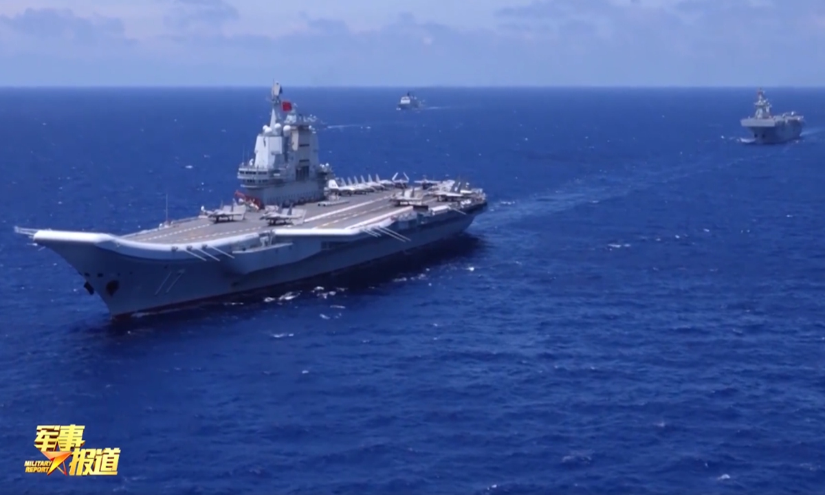 The aircraft carrier Shandong (left) is followed by a Type 075 amphibious assault ship in a far seas combat exercise of the Chinese People's Liberation Army (PLA) Navy in the South China Sea and the West Pacific waters in the summer of 2024. Photo: Screenshot from China Central Television