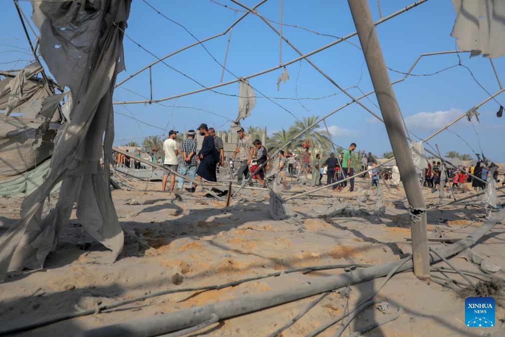 Palestinians check the damage after an Israeli airstrike in the Al-Mawasi area, west of Khan Younis, in the southern Gaza Strip, on Sept. 10, 2024. At least 40 Palestinians were killed and more than 60 others wounded in an Israeli airstrike on tents sheltering displaced people in Khan Younis in southern Gaza, Palestinian and Israeli sources said Tuesday. (Photo: Xinhua)