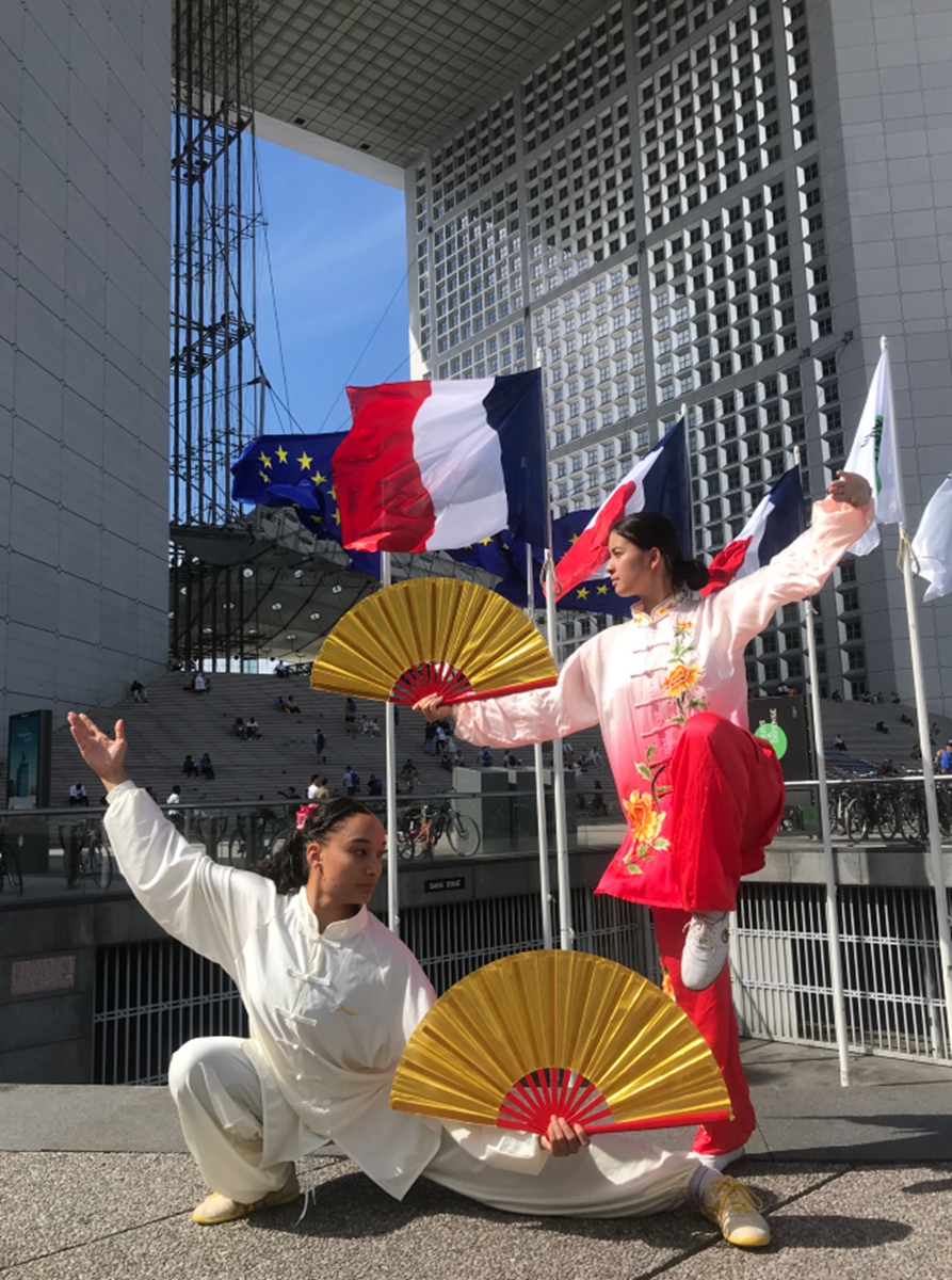 Students of Fang Xiaofen's martial arts clubs perform in Paris, France. Photo: Courtesy of Fang Xiaofen